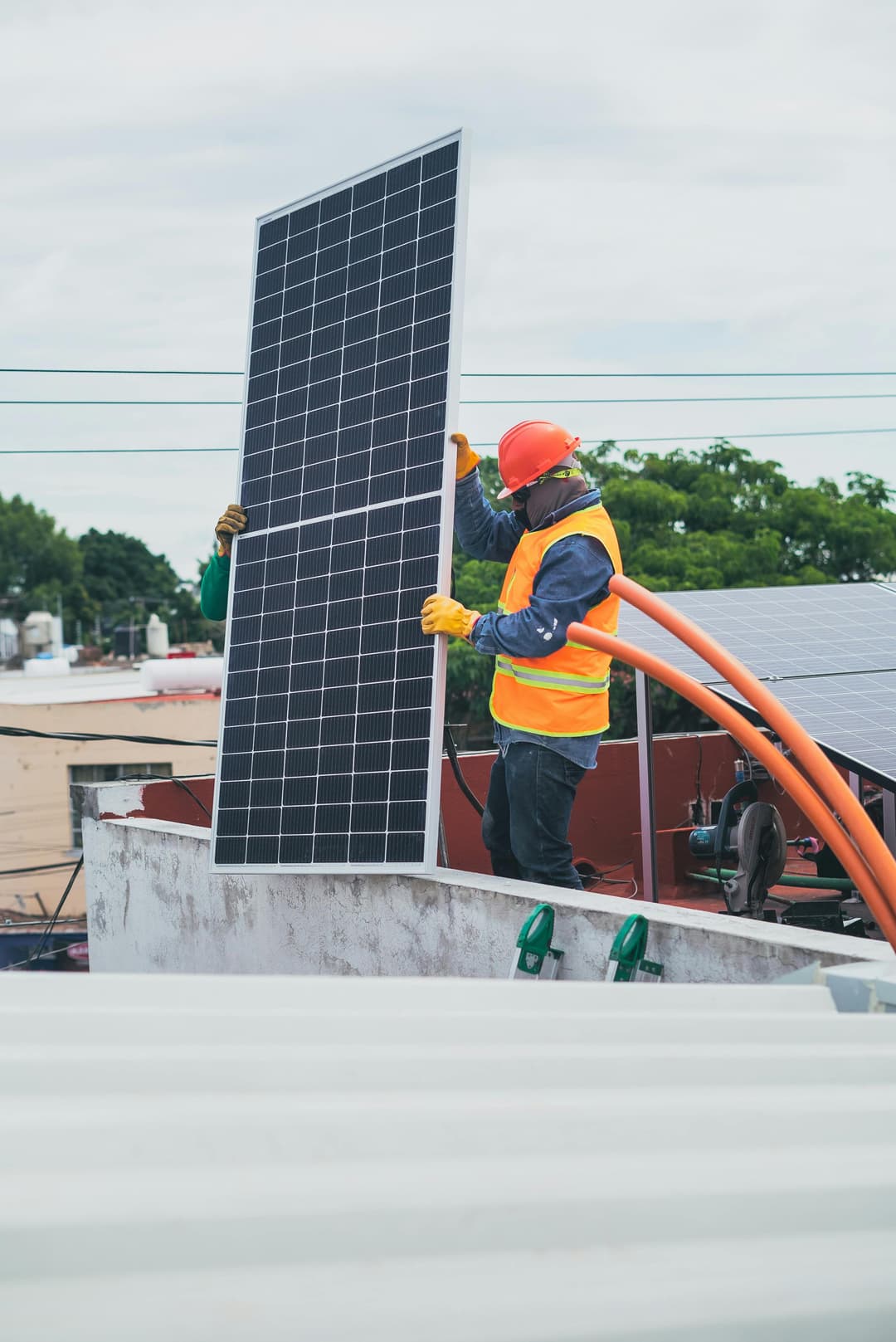 engineer installing solar panel